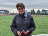 Superintendent Ginger Redlinger pauses before beginning a presentation at a welcome back event.