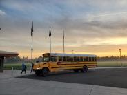A school bus pulls in to drop off Middle School students on a fine fall morning on Oct. 19. Photo by David Sheldon