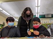 Third-graders Brian Hernandez Rojas and Gabriel Sanchez work on their cause-and-effect assignment in Jana Giles’s class. 
