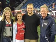 Michael Stewart visits with family after a game. From left are: Sherry, Ryan's wife Emily, Ryan, and Stewart. 