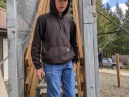 Eighth-grader Addison Jakobson descends the Clatskanie Mountain Fire Lookout after taking in the 360-degree view.