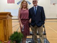 Middle School Principals Tami Badinger, left, and David Sheldon pose before the ceremony.