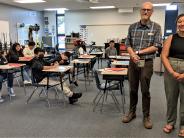 Teacher John Young, Instructional Assistant Dani Perez Vargas, and their students take a break.