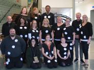 North Marion High School staff members, under Remy Strapp's direction, became a pack of dominos! Photo by Yadira Romero Navarro