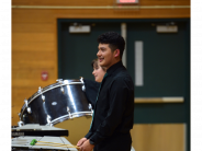 Student Playing the drums