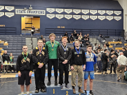 HS Wrestlers standing on Podium