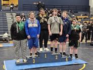 HS Wrestlers standing on Podium