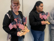 Teacher holding flags