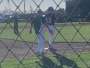 Student playing baseball