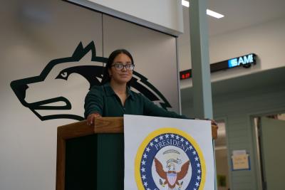 Yadira Romero Navarro poses at the podium. Photo by Calvin Parmenter