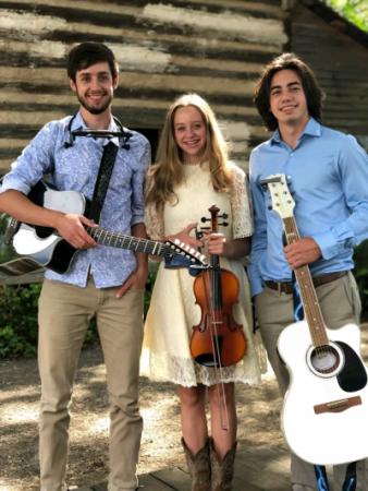 From left to right are the members of the Gianella Trio: Logan, Amelia, and Colby, a performing group.