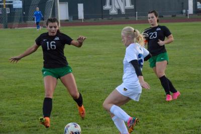 Girls playing soccer