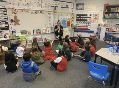 Teacher reading to students