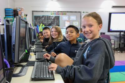 Students working on computers