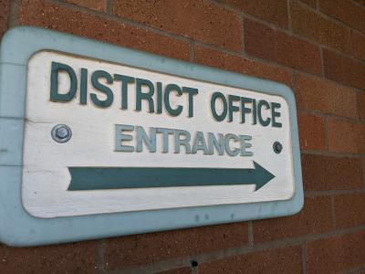 sign that reads district office entrance