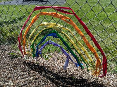 An image of a little rainbow attached to the Primary School fence