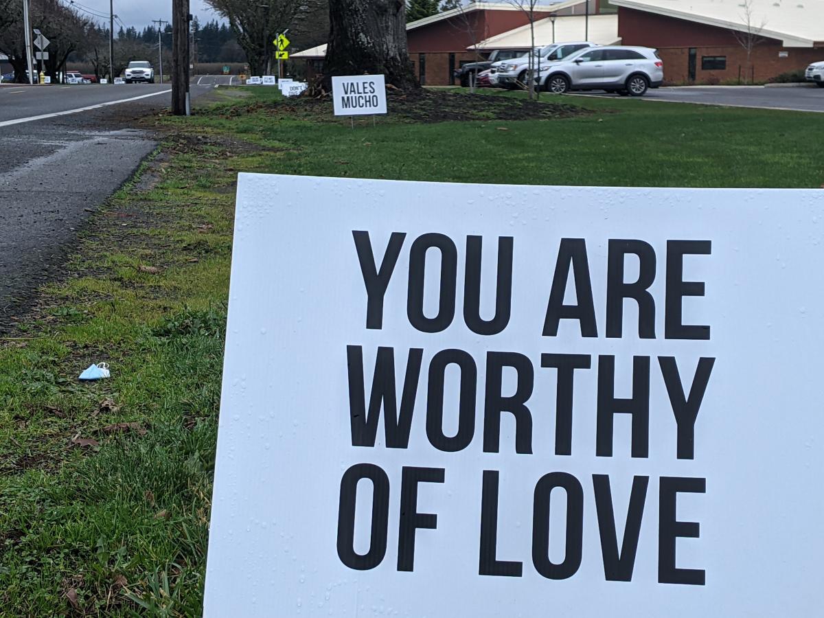 A sign that says: "You are worthy of love."