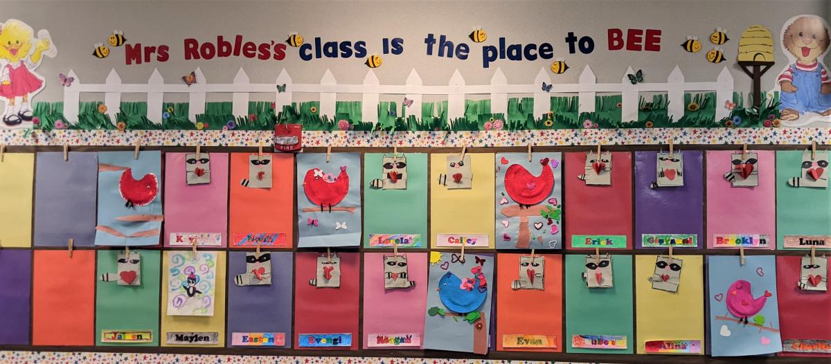 Second-Grade Teacher Casey Robles spotlights student art on Valentine's Day. Photo by Jillian Daley