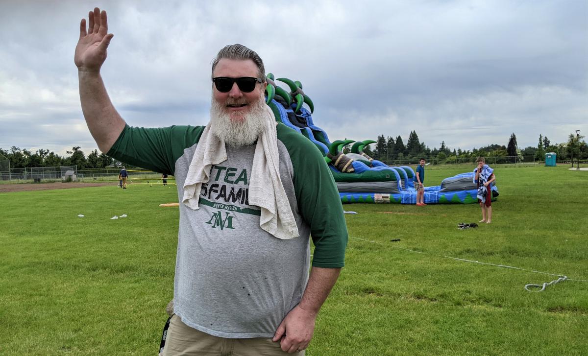 Science Teacher Mark John monitored students on the water slide during Field Day at the Middle School on Wednesday. 