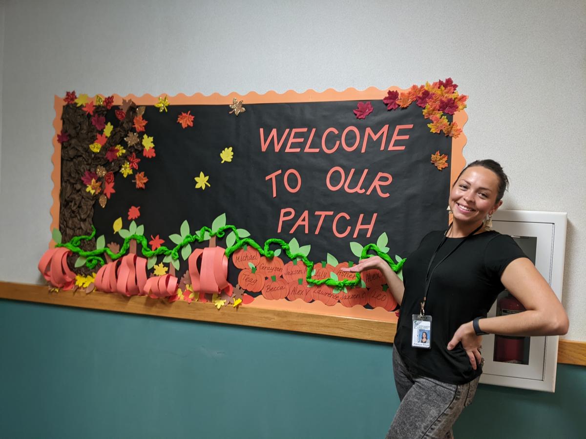 Primary School Instructional Assistant Alesiya Royal, who brings joy to her school with stunning fall art displays, says that, a