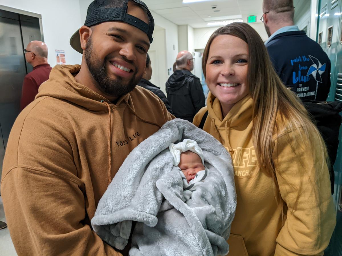 Young Life Woodburn Staff Area Director Emilio Diaz and his wife, Jessica, brought their infant, Jirew, to the Greeters event.