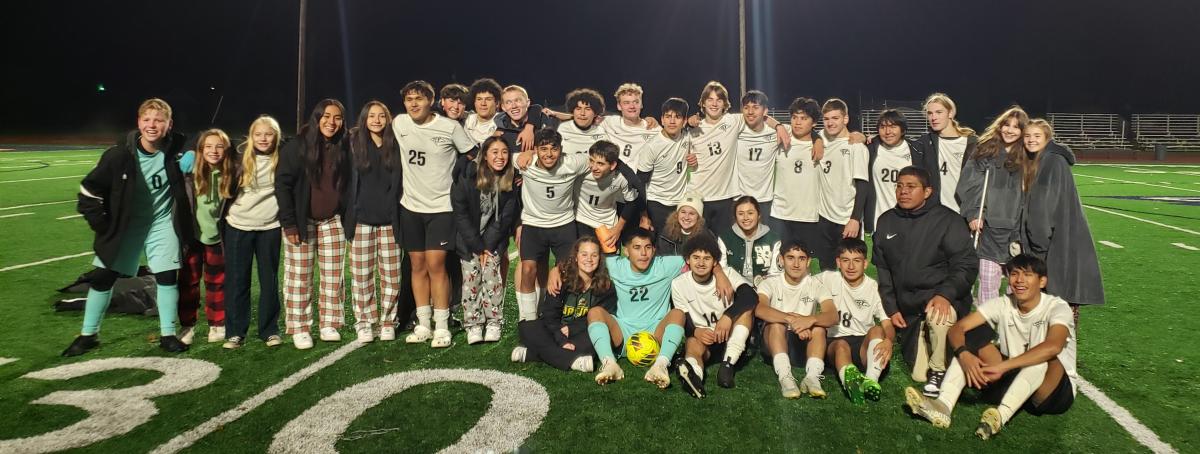 North Marion Boys and Girls soccer teams celebrate after winning in the quarterfinals. Photo by Anita Whitehead