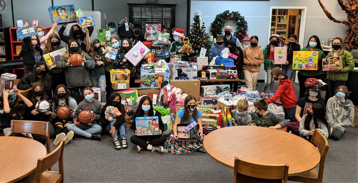 Middle School students celebrate Giving Tree project success. Photo by Jillian Daley