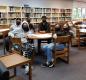 The Middle School (MS) AVID crew creates Giving Tree posters in the MS library. Photo courtesy of Marie Jones