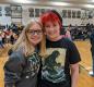 Ninth-graders Adeline Walters, left, and Claire Leder were thrilled to see all their friends again during Freshman Orientation.