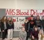 High School Students promoting blood drive